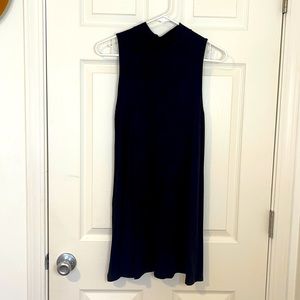 All black mini tank dress with mock turtle neck